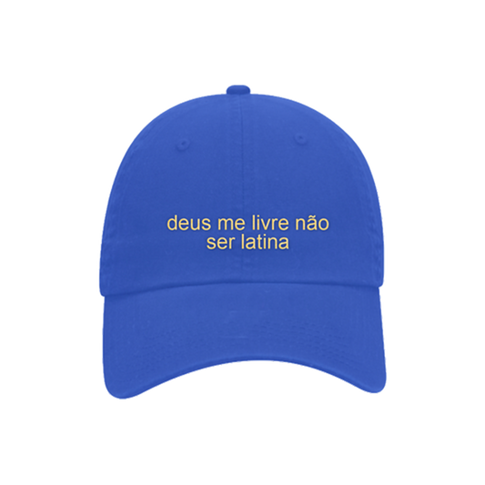 Front of a Blue cap with yellow text 'deus me livre não ser latina'